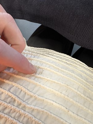 Lot 98 - A white muslin spencer, English, 1813-1815