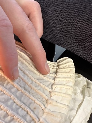 Lot 98 - A white muslin spencer, English, 1813-1815