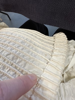 Lot 98 - A white muslin spencer, English, 1813-1815