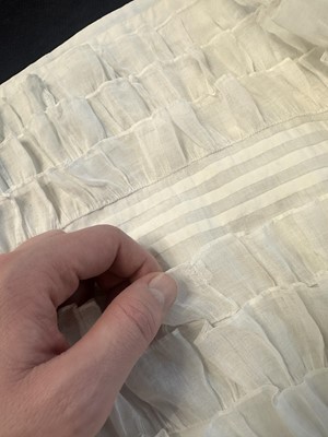 Lot 98 - A white muslin spencer, English, 1813-1815