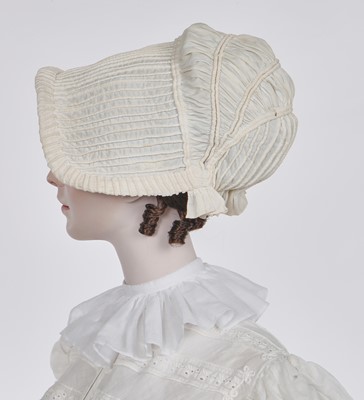 Lot 98 - A white muslin spencer, English, 1813-1815