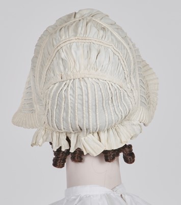 Lot 98 - A white muslin spencer, English, 1813-1815