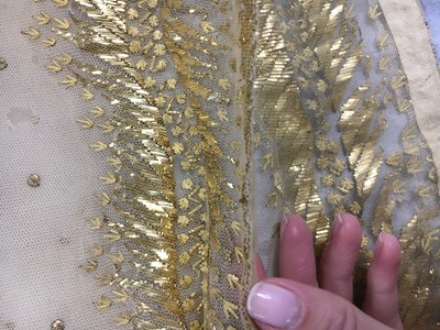 Lot 49 - A gold embroidered silk tulle dance dress, French, circa 1807