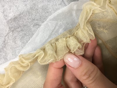 Lot 49 - A gold embroidered silk tulle dance dress, French, circa 1807