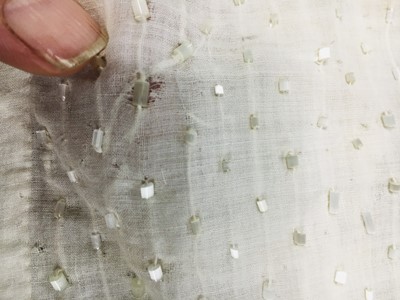 Lot 44 - A rare white bugle beaded batiste evening gown, English, circa 1805