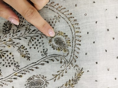 Lot 44 - A rare white bugle beaded batiste evening gown, English, circa 1805