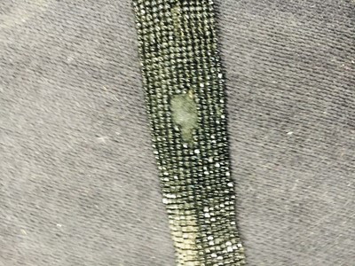 Lot 44 - A rare white bugle beaded batiste evening gown, English, circa 1805