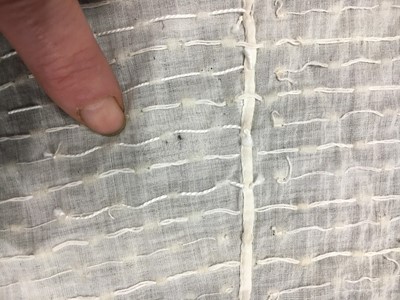 Lot 44 - A rare white bugle beaded batiste evening gown, English, circa 1805