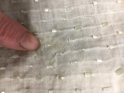 Lot 44 - A rare white bugle beaded batiste evening gown, English, circa 1805