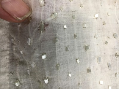 Lot 44 - A rare white bugle beaded batiste evening gown, English, circa 1805