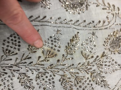 Lot 44 - A rare white bugle beaded batiste evening gown, English, circa 1805