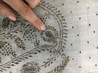 Lot 44 - A rare white bugle beaded batiste evening gown, English, circa 1805