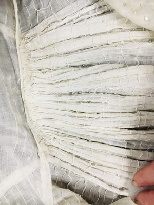 Lot 44 - A rare white bugle beaded batiste evening gown, English, circa 1805