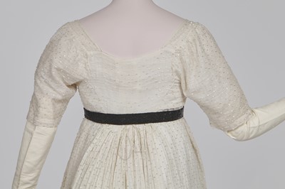 Lot 44 - A rare white bugle beaded batiste evening gown, English, circa 1805