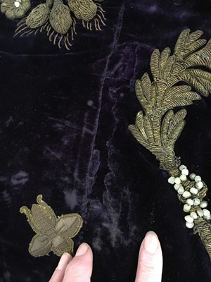 Lot 120 - A rare embroidered purple velvet court train bearing the iconography of Napoleon I