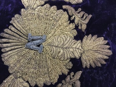 Lot 120 - A rare embroidered purple velvet court train bearing the iconography of Napoleon I