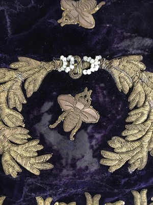 Lot 120 - A rare embroidered purple velvet court train bearing the iconography of Napoleon I