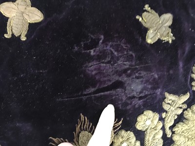 Lot 120 - A rare embroidered purple velvet court train bearing the iconography of Napoleon I
