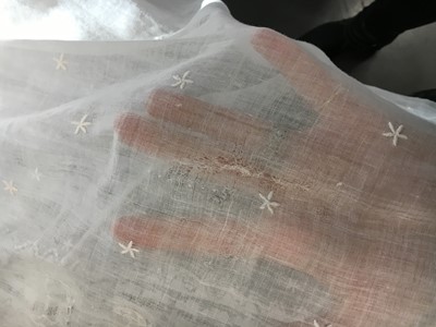 Lot 48 - A whitework embroidered muslin dress, French, circa 1806