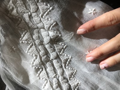 Lot 48 - A whitework embroidered muslin dress, French, circa 1806