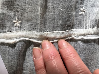 Lot 48 - A whitework embroidered muslin dress, French, circa 1806