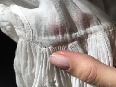 Lot 48 - A whitework embroidered muslin dress, French, circa 1806