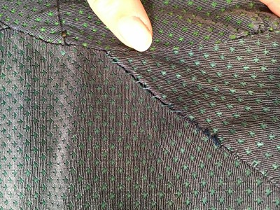 Lot 14 - A gentleman's blue and green voided velvet tailcoat, French, circa 1800