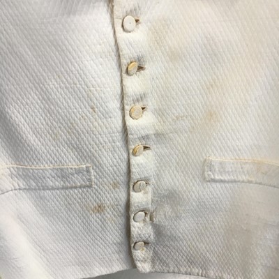 Lot 14 - A gentleman's blue and green voided velvet tailcoat, French, circa 1800