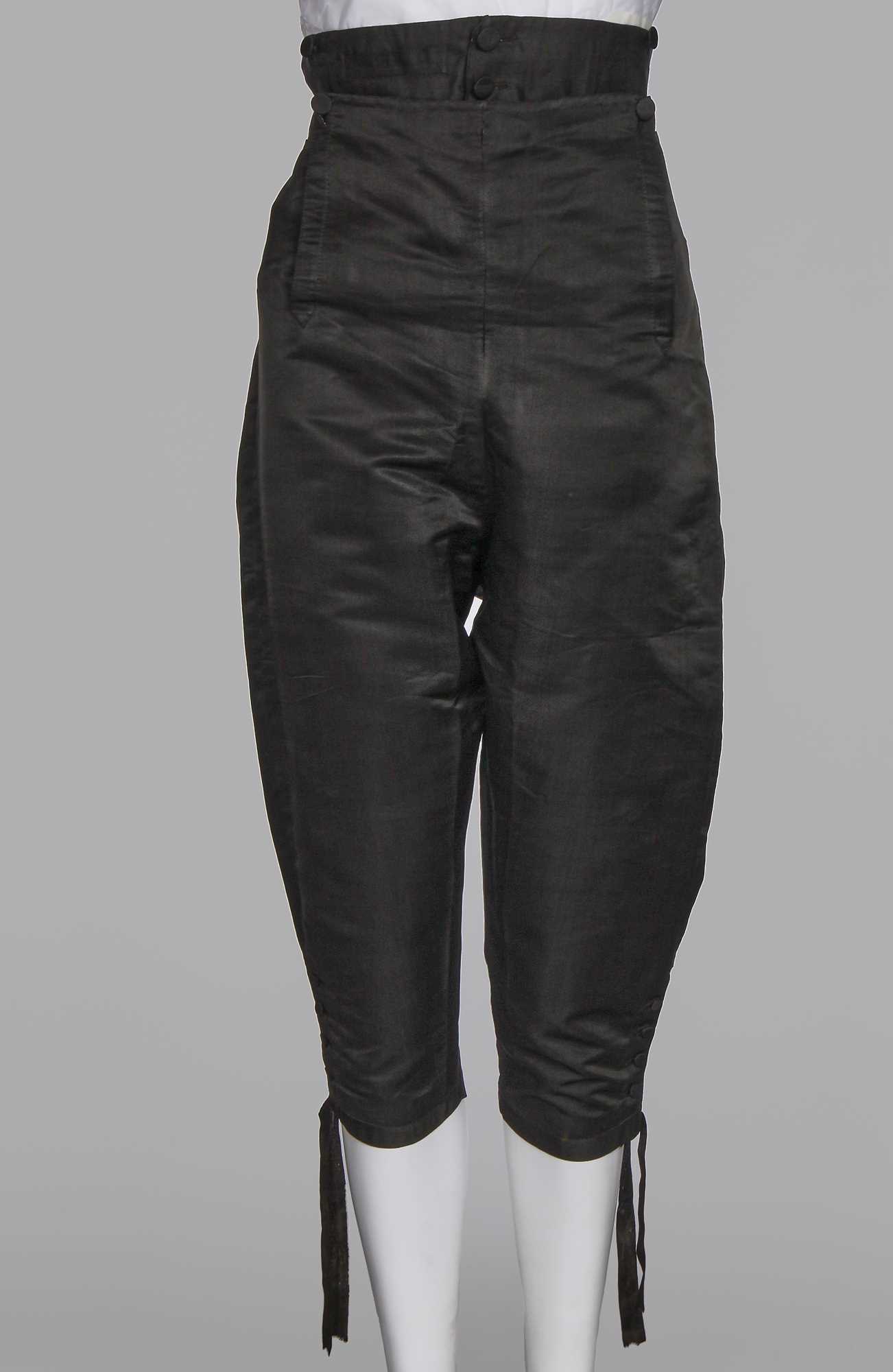 Lot 66 - A pair of black satin breeches, 1800-1810