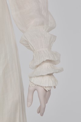 Lot 86 - A white-worked muslin day dress, English, circa 1812