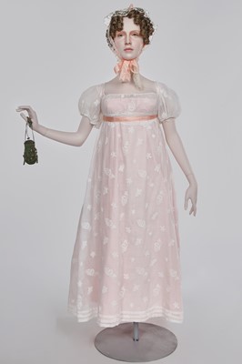 Lot 52 - A finely embroidered muslin evening dress, French, circa 1807