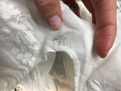 Lot 52 - A finely embroidered muslin evening dress, French, circa 1807