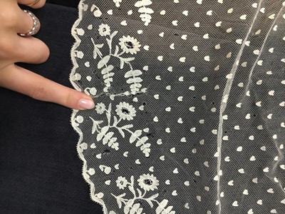 Lot 52 - A finely embroidered muslin evening dress, French, circa 1807