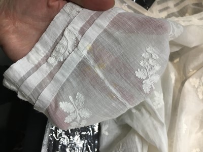 Lot 52 - A finely embroidered muslin evening dress, French, circa 1807