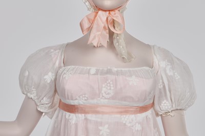 Lot 52 - A finely embroidered muslin evening dress, French, circa 1807