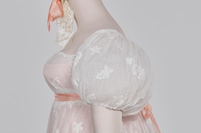 Lot 52 - A finely embroidered muslin evening dress, French, circa 1807