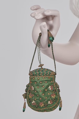 Lot 52 - A finely embroidered muslin evening dress, French, circa 1807