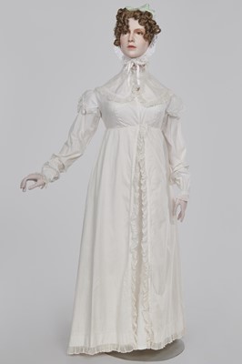 Lot 101 - A white percale morning coat, English, circa 1814