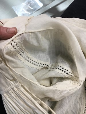 Lot 59 - A white self-striped cotton high dress, English, circa 1809