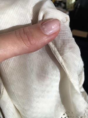 Lot 59 - A white self-striped cotton high dress, English, circa 1809