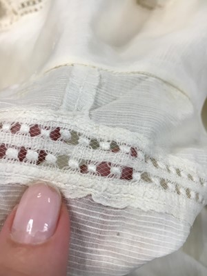 Lot 59 - A white self-striped cotton high dress, English, circa 1809