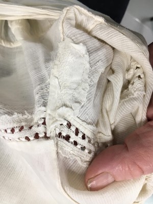 Lot 59 - A white self-striped cotton high dress, English, circa 1809