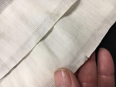 Lot 59 - A white self-striped cotton high dress, English, circa 1809