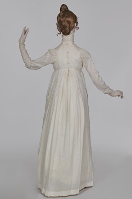 Lot 59 - A white self-striped cotton high dress, English, circa 1809