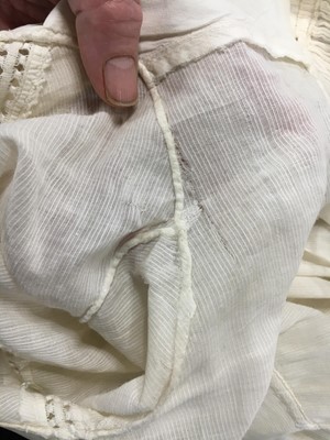 Lot 59 - A white self-striped cotton high dress, English, circa 1809