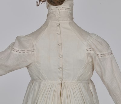 Lot 59 - A white self-striped cotton high dress, English, circa 1809