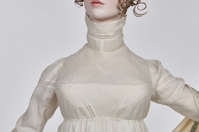 Lot 59 - A white self-striped cotton high dress, English, circa 1809