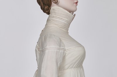 Lot 59 - A white self-striped cotton high dress, English, circa 1809
