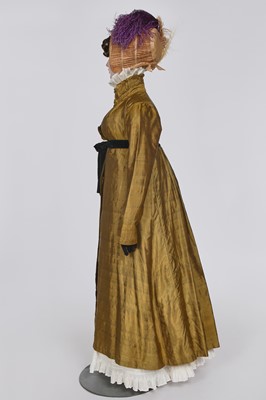 Lot 90 - A brown-green sarsanet redingote/pelisse, 1810-1815