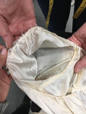 Lot 75 - An ivory silk dress, French, circa 1809-13